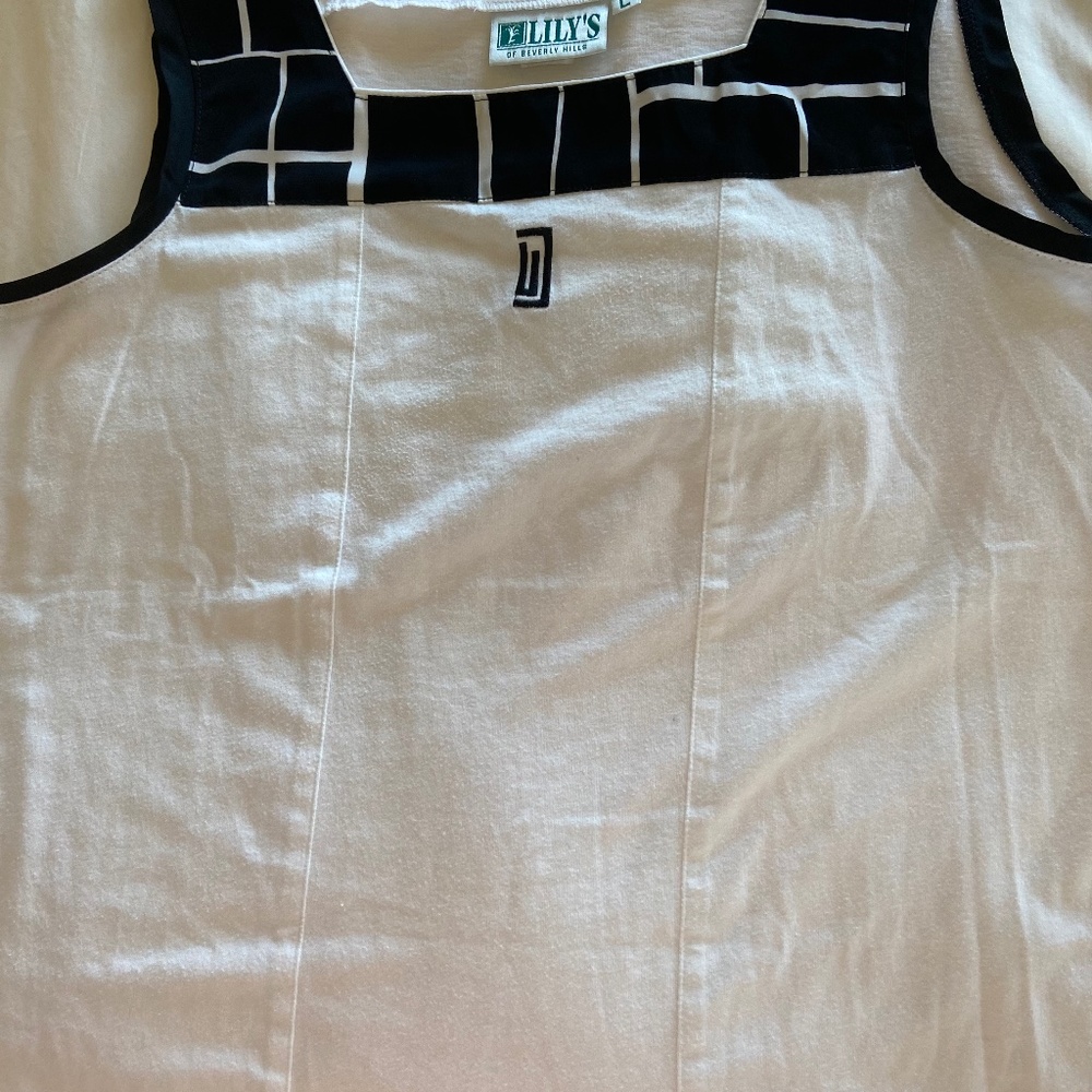 Chic designer tennis top, white and black, size L